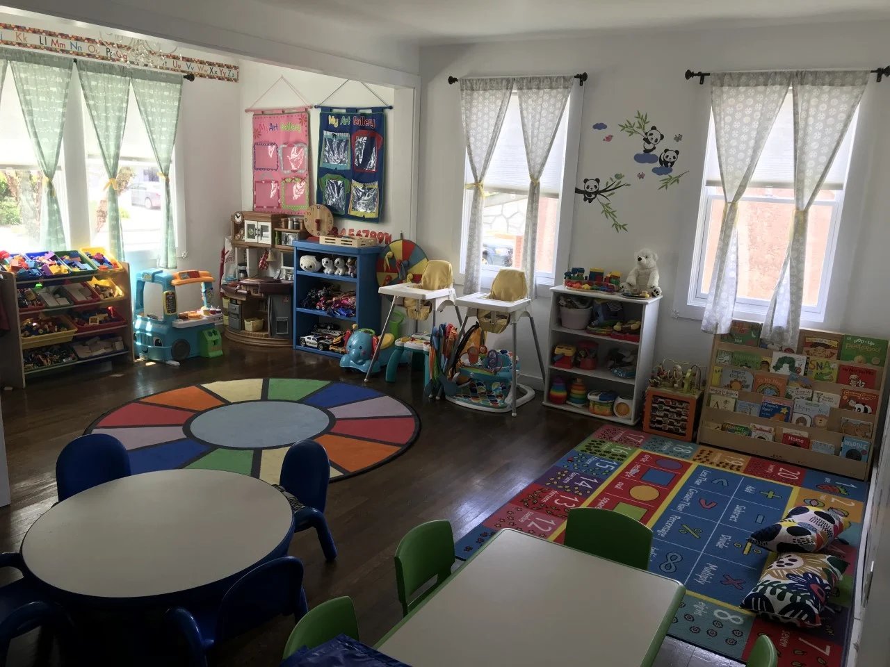 Look What I Made wall with kids artwork display